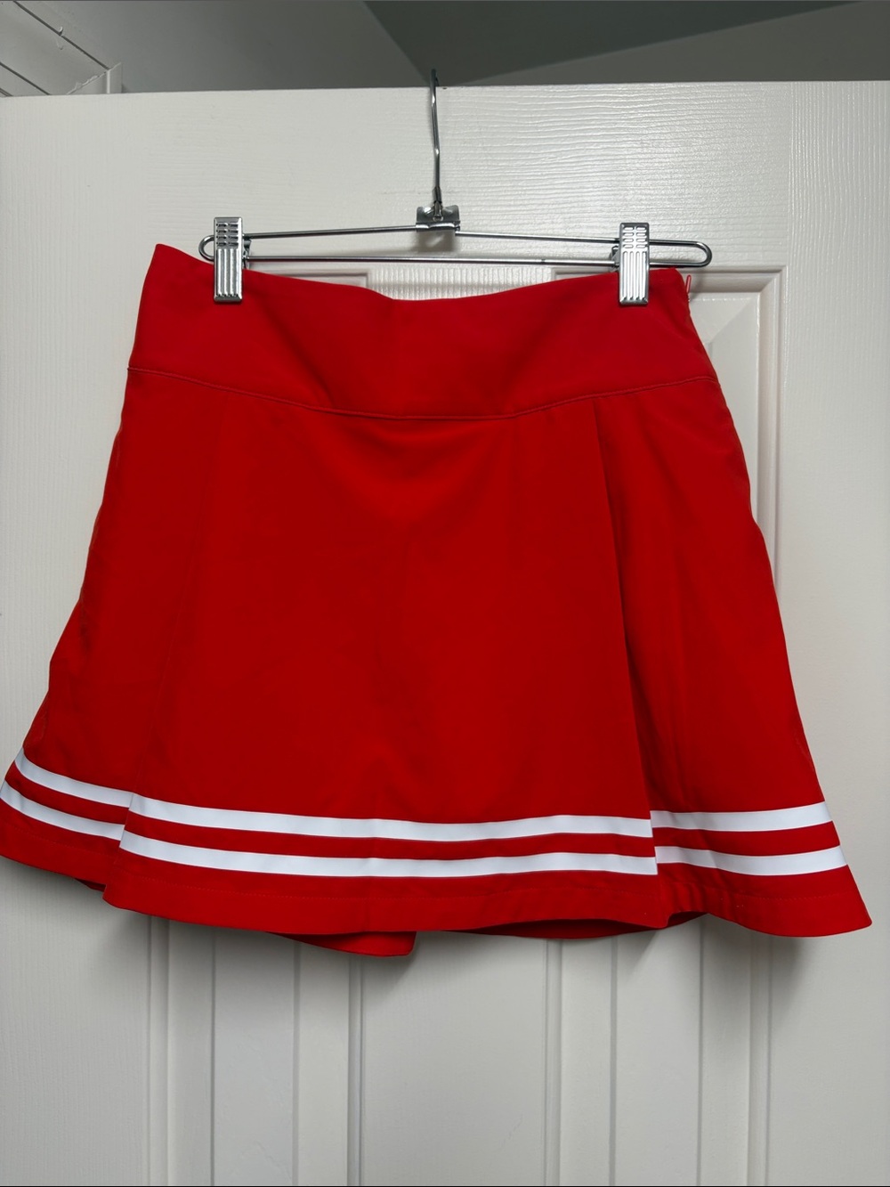 Calia Bright Red golf skort with White Hem Stripes